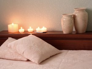 Luxury pillow, vases and candles in a low lit room. Therapy for couples, families and individuals at Northside Mental Health in Indianapolis, IN. 46220