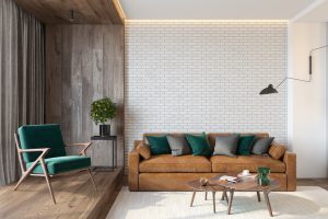 Modern room interior with brick wall blank wall, sofa, lounge chair, table, wooden wall and floor, plants, carpet, hidden lighting. This could be a comfortable setting for counseling for infidelity and affair recovery at Northside Mental Health in Indianapolis, IN 46220