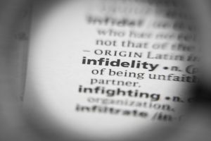 The word infidelity in a dictionary. You can get help for affair recovery and infidelity counseling at Northside Mental Health in Indianapolis, IN 46220