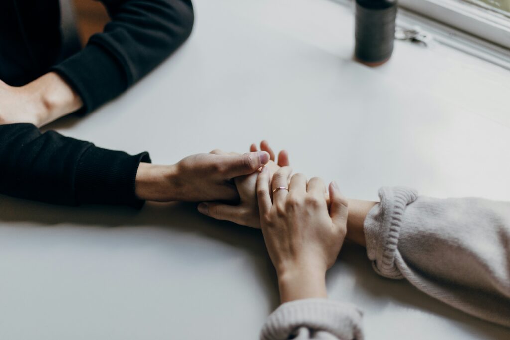 Image of a couple holding hands